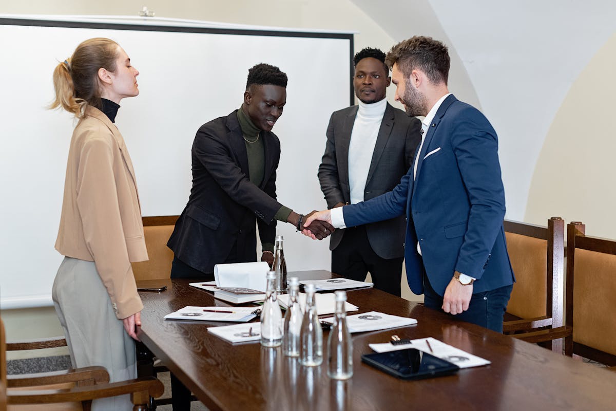 Professionals in a conference room — institutional partnership